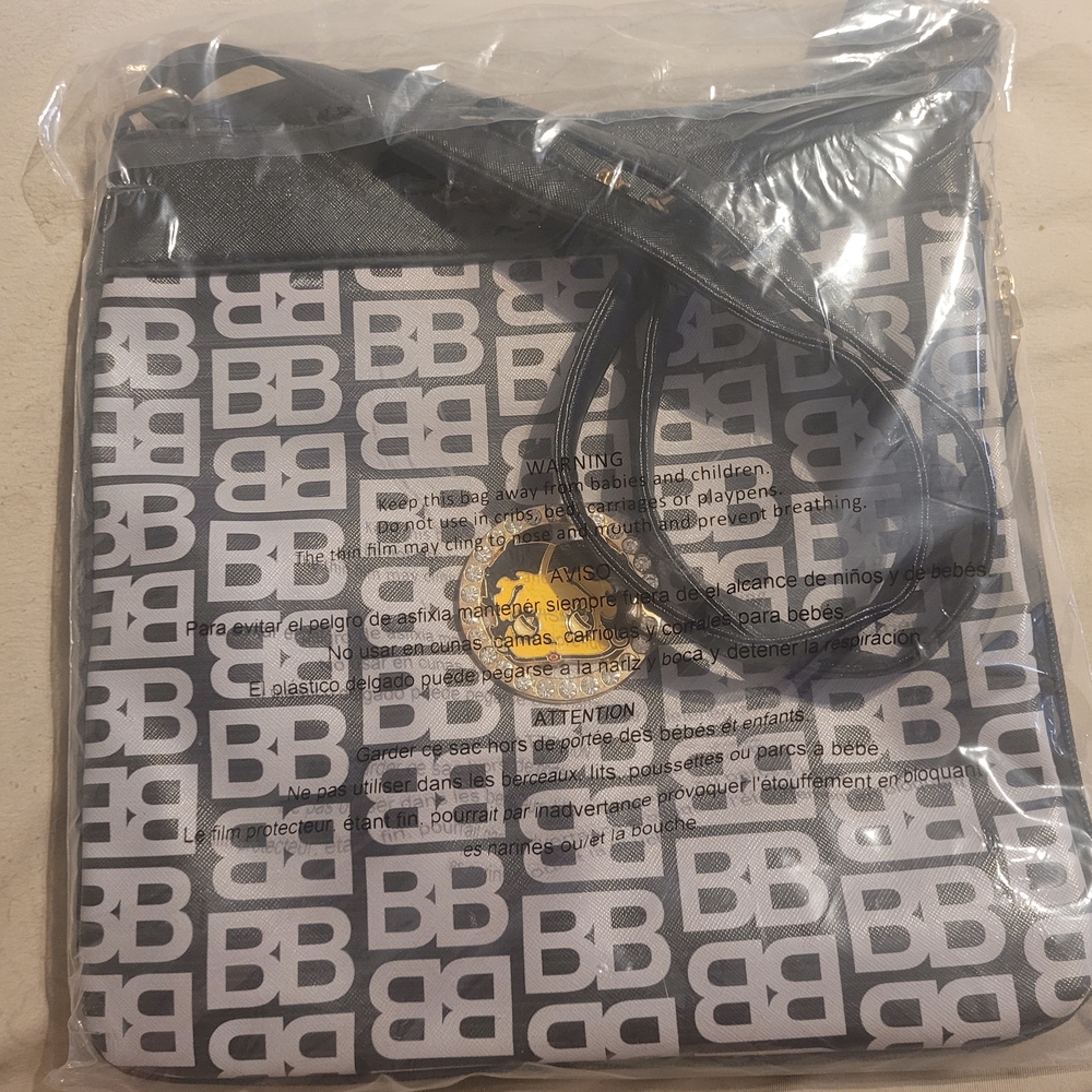 Elegant Black and White Patterned Crossbody Bag